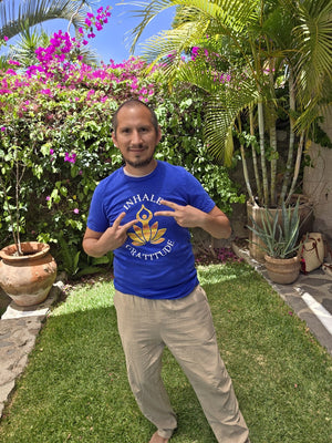 A friend of Zenfull Heart wearing the Inhale Gratitude tee in royal blue